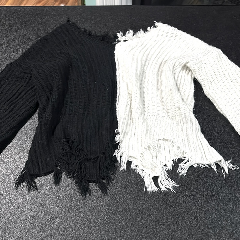 Half black, half white sweater